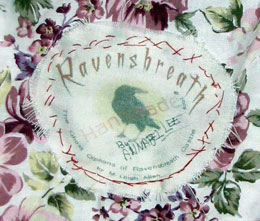 Ravensbreath patch on Annabel doll's sack with her name scribbled on