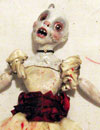 very singed ghost doll